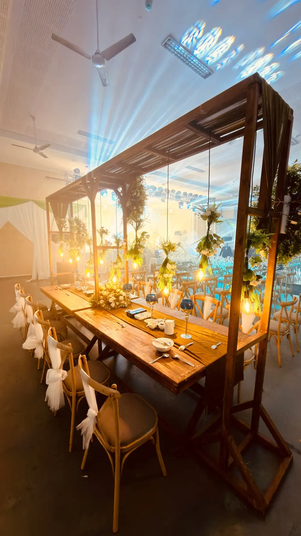 Rustic food counter under hanging lights — Shadhi Catering and Event Management